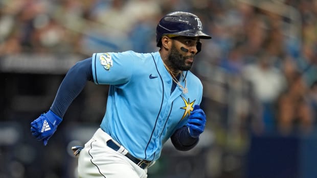 Yandy Díaz hits a home run for the Tampa Bay Rays.